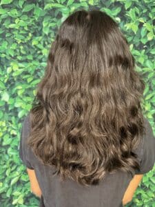 Curly hair trends 2026 include letting hair flow naturally.