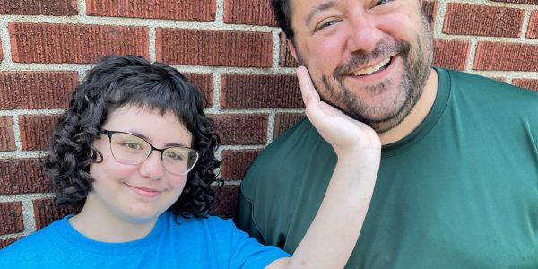 kindred-curl-back-to-school-haircut Girl with her dad in front of salon